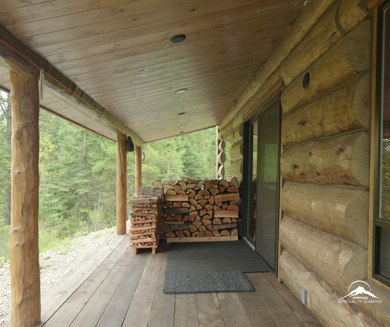A covered porch with room to stack firewood and enjoy the outdoors.