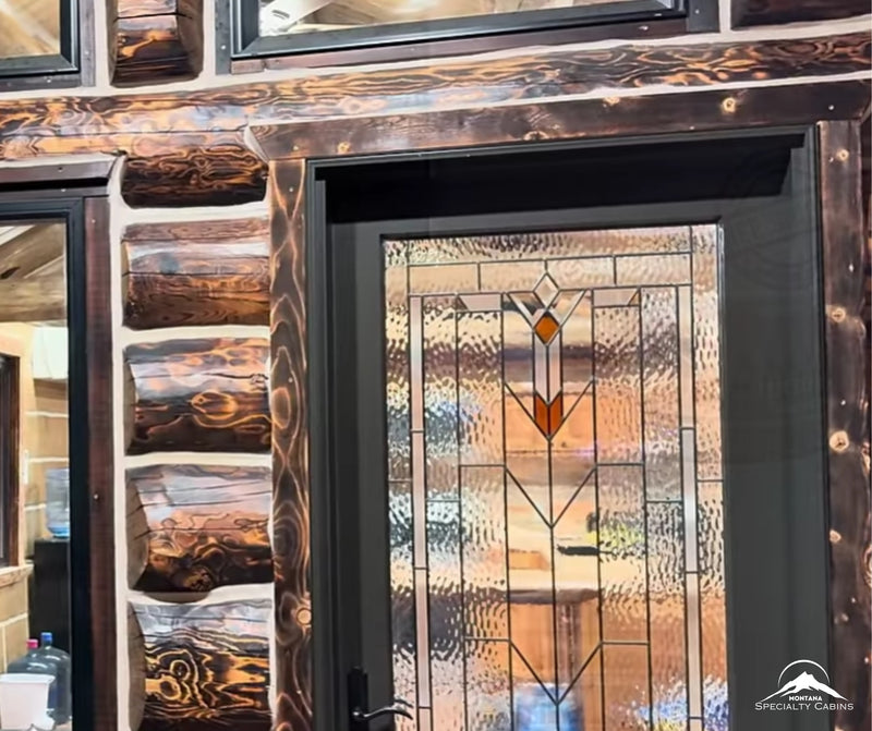Custom entry details that bring timeless cabin character.