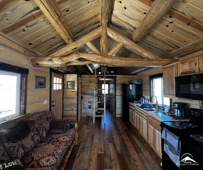 Open living space with loft ladder access